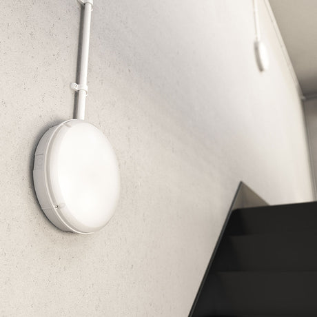 IP65 Bulkhead LED round light on stairwell corridor wall - white