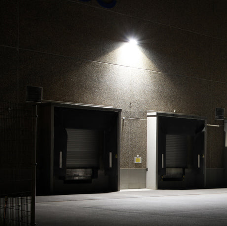 flood light illuminated on an external building wall