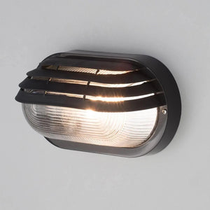 Oval Bulkhead Outdoor Glass Wall Light Fitting | E27 | IP44 | Black Caged